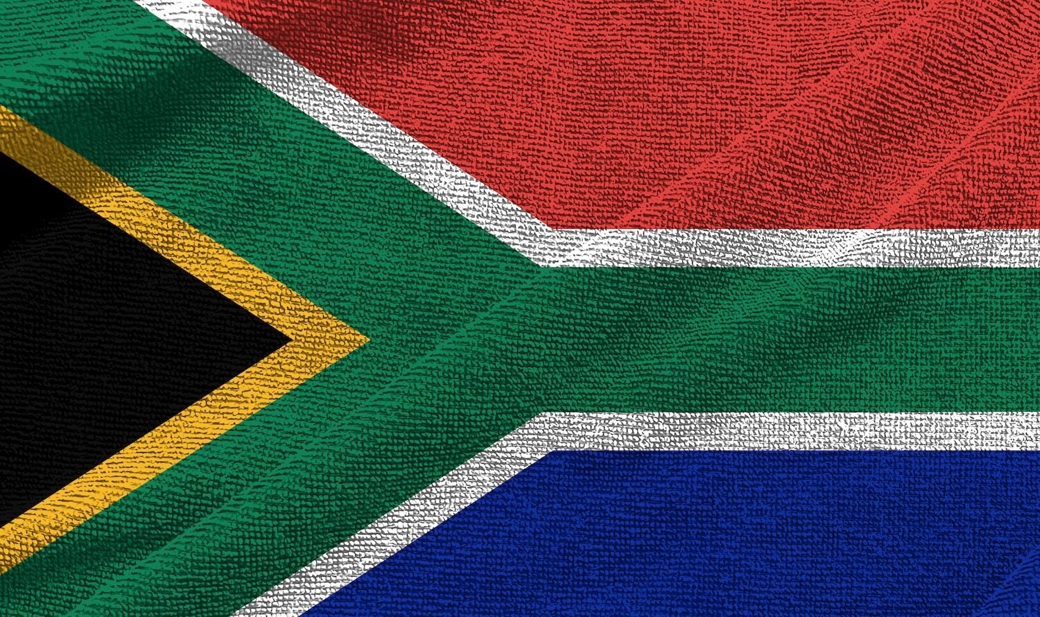 A South African flag to show can I invest in UK property from South Africa