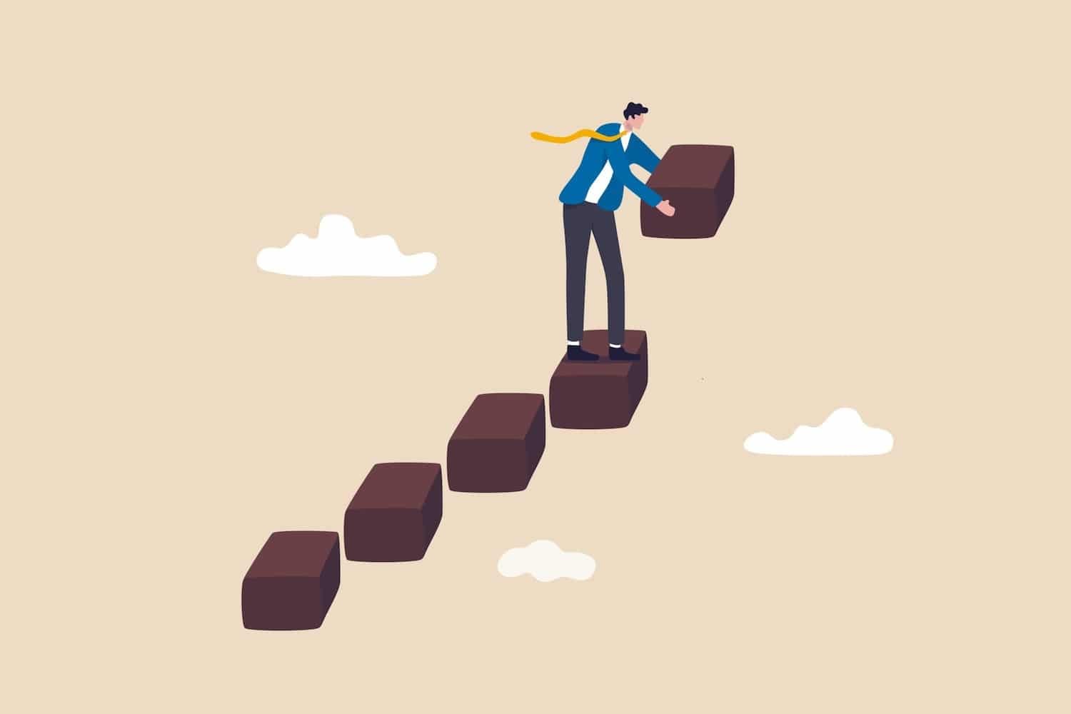 a man climbing stairs, learning how to build a uk property portfolio